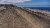Kini, ukiran tersebut dipenuhi dengan ratusan jejak ban dari sepeda motor dan kendaraan off-road yang merobek karya seni berusia ribuan tahun tersebut, sehingga merusaknya secara permanen. 