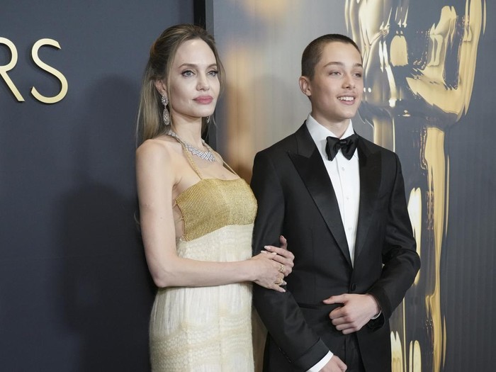 Knox Leon Jolie-Pitt, left, and Angelina Jolie arrive at the 15th Governors Awards on Sunday, Nov. 17, 2024, at The Ray Dolby Ballroom in Los Angeles. (Photo by Jordan Strauss/Invision/AP)
