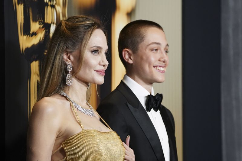 Knox Leon Jolie-Pitt, left, and Angelina Jolie arrive at the 15th Governors Awards on Sunday, Nov. 17, 2024, at The Ray Dolby Ballroom in Los Angeles. (Photo by Jordan Strauss/Invision/AP)