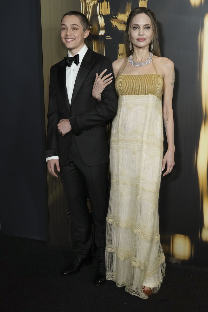 Knox Leon Jolie-Pitt, left, and Angelina Jolie arrive at the 15th Governors Awards on Sunday, Nov. 17, 2024, at The Ray Dolby Ballroom in Los Angeles. (Photo by Jordan Strauss/Invision/AP)