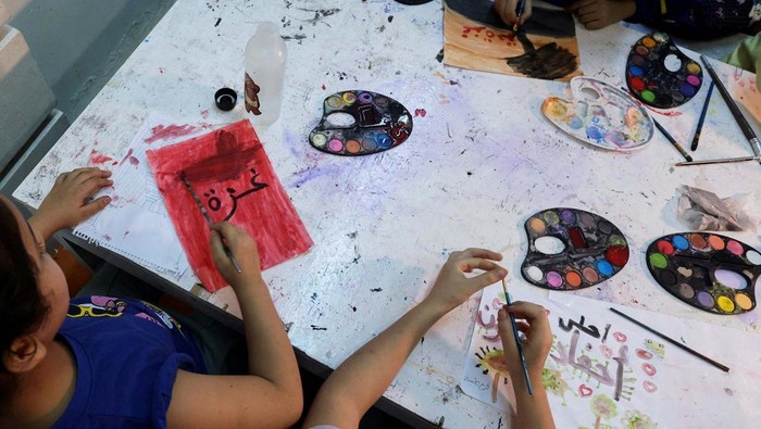 A drawing of a Palestinian flag hangs on a wall in the 