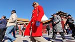 Warga Beijing Menggigil Hadapi Gelombang Dingin