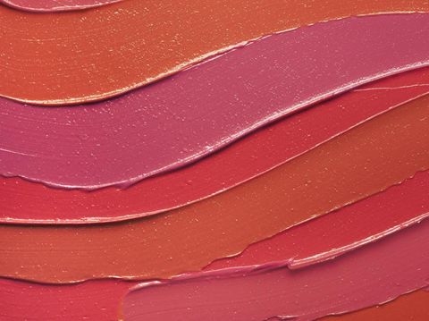 Smudged vibrant red purple pink textured tint or lipstick