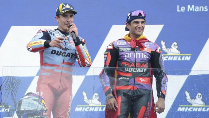 LE MANS, FRANCE - MAY 12: Second place Marc Marquez of Spain #93 and Gresini Racing MotoGP (Ducati), winner Jorge Martin of Spain #89 and Prima Pramac Racing (Ducati) during the podium ceremony following the 2024 MotoGP of France (race) on day 3 of the Michelin Grand Prix de France 2024 at the Circuit Bugatti on May 12, 2024 in Le Mans, France. (Photo by Jean Catuffe/Getty Images)