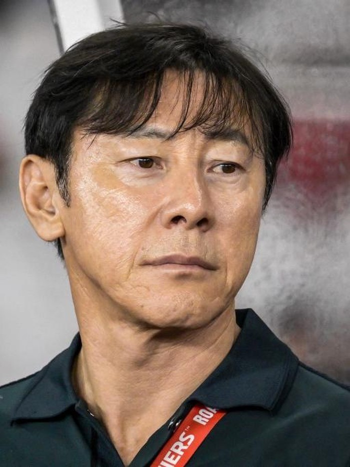 Indonesias national team coach Shin Tae Yong looks on during the 2026 World Cup Asian qualification football match between Saudi Arabia and Indonesia at Bung Karno Stadium in Jakarta on November 19, 2024. (Photo by BAY ISMOYO / AFP)