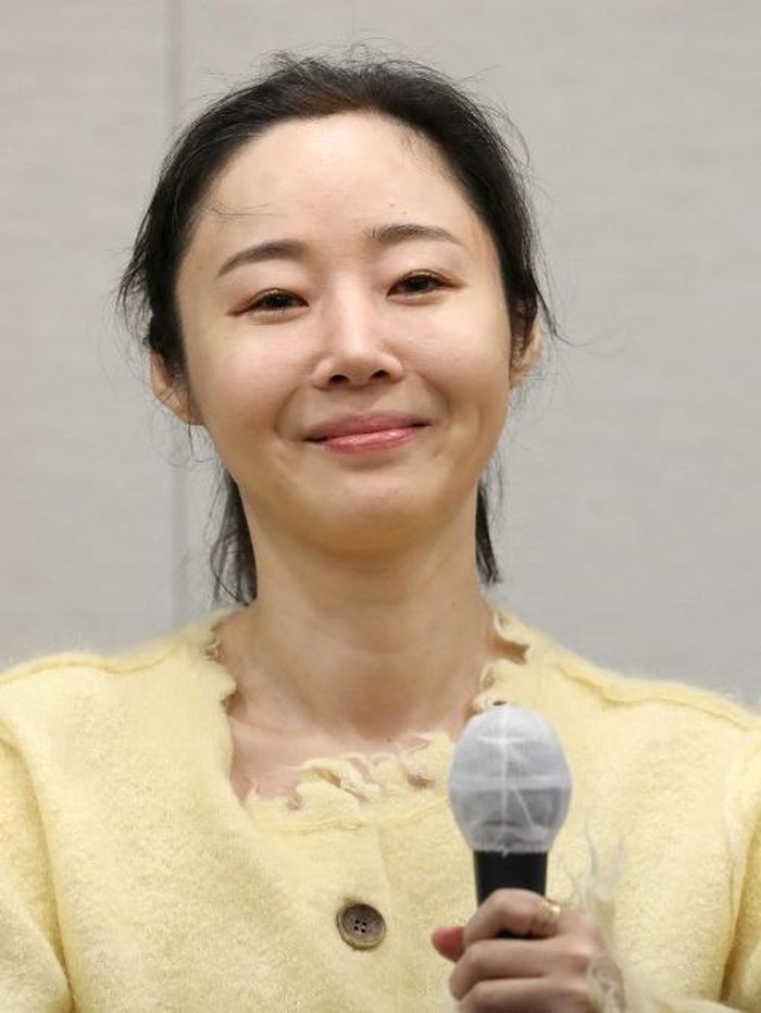 SKOREA-MUSIC-KPOP-HYBE Min Hee-jin, CEO of ADOR, a subsidiary label of K-pop powerhouse HYBE, reacts during a press conference following her companys shareholder meeting in Seoul on May 31, 2024. (Photo by Han Myung-Gu / POOL / AFP)