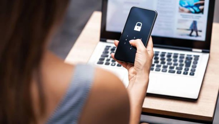 Phone lock code. Smartphone protection with 2fa (two factor authentication). Smartphone protection and security with pin number. Encrypted data. Personal online privacy. Cyber hacker threat.