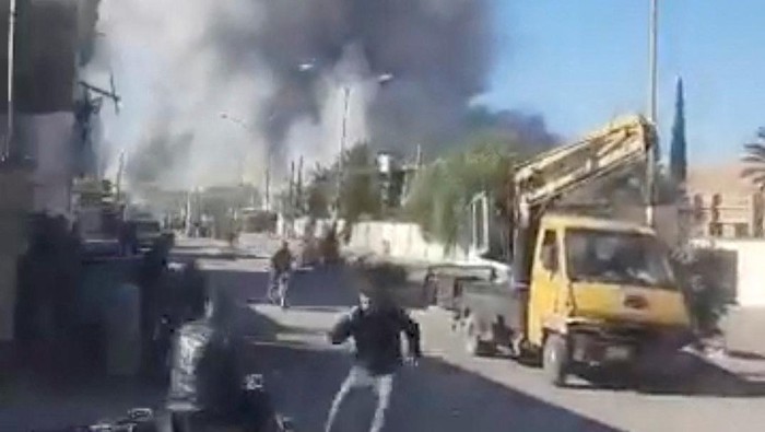 Smoke billows following an explosion after an attack on the historic city of Palmyra, Syria November 20, 2024, in this screengrab obtained from a social media video. via REUTERS  THIS IMAGE HAS BEEN SUPPLIED BY A THIRD PARTY. NO RESALES. NO ARCHIVES.