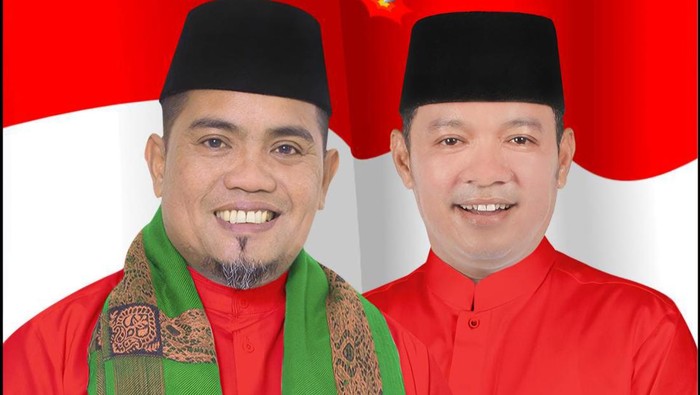 Calon Bupati dan Wakil Bupati Pelalawan, Zukri-Husni Tamrin. (Dok Istimewa)