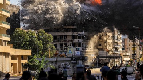 Fire and smoke erupt from a building just after an Israeli airstrike in Beiruts southern Shayah neighbourhood on November 22, 2024, amid the ongoing war between Israel and Hezbollah. (Photo by AFP)