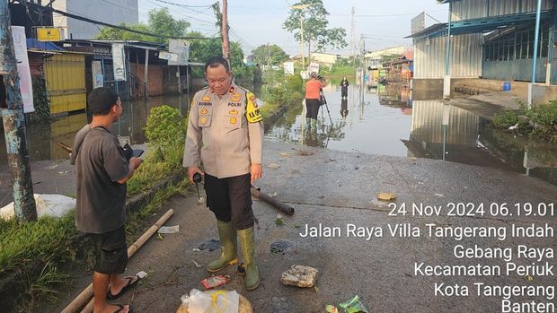 Banjir di Priuk Kota Tangerang akibat tanggul meluap