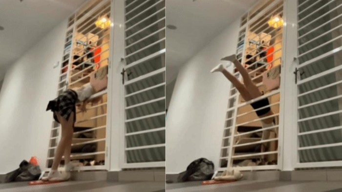 Wanita handstand masuk rumah
