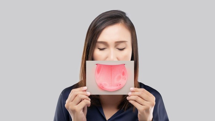 The woman show the picture of tongue problems, Illustration benign migratory glossitis on a brown paper, Behcets Disease
