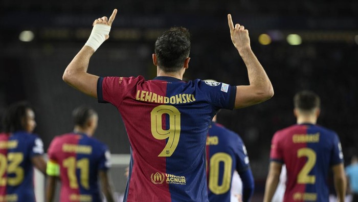 BARCELONA, SPAIN - NOVEMBER 26: Barcelonas Polish forward Robert Lewandowski celebrates his goal during the UEFA Champions League football match between FC Barcelona and Stade Brestois at the Estadi Olimpic Lluis Companys, in Barcelona, on November 26, 2024. (Photo by Adria Puig/Anadolu via Getty Images)