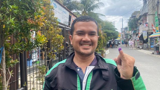 Sopir ojol bernama Filemon usai nyoblos (Joakhim/detikcom)