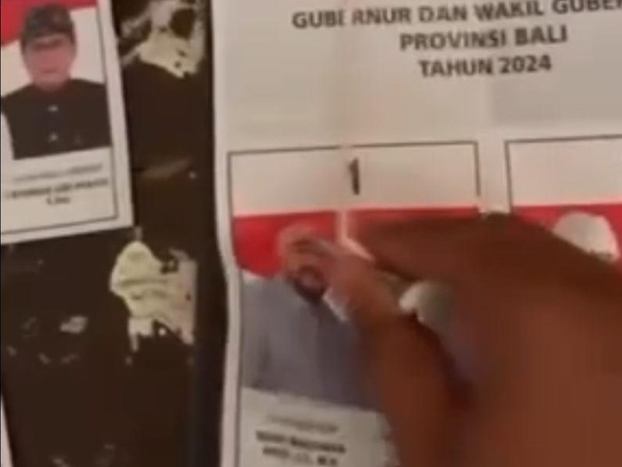 Tangkapan layar video seseorang mencoblos banyak surat suara Mulia-PAS, Rabu (27/11/2024).