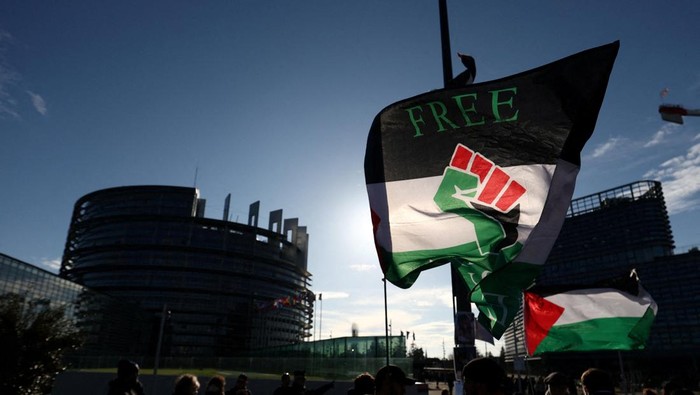 A flag is flown during a protest in support of Palestinians in Gaza, amid the ongoing conflict between Israel and Hamas, outside the European Parliament, in Strasbourg, France November 27, 2024. REUTERS/Yves Herman