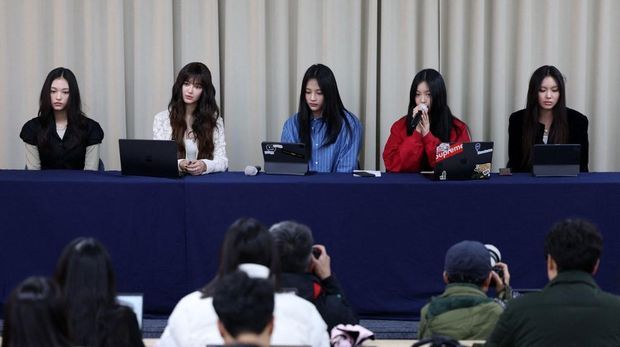 South Korean K-pop girl group NewJeans members (L-R) Haerin, Danielle, Minji, Hanni and Hyein attend a press conference in Seoul on November 28, 2024. Chart-topping K-pop group NewJeans quit their label ADOR, citing the group faced 