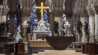 Sebagai mahakarya Gotik abad pertengahan, Notre-Dame tetap menjadi simbol penting budaya Prancis dan destinasi wisata favorit dunia.  AP/Christophe Petit Tesson 