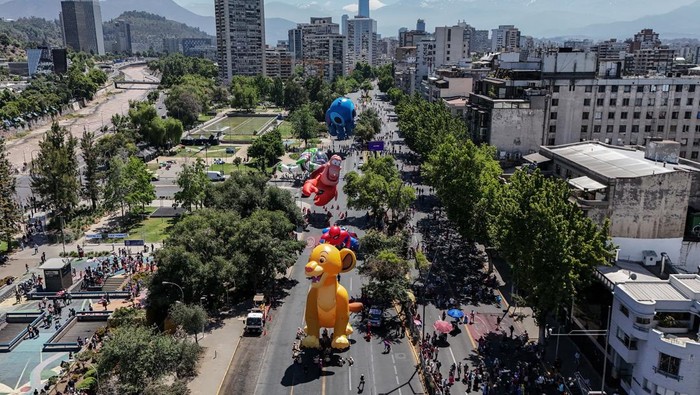 Balloons of Disney's characters float during a department store's parade, as Christmas festive season starts in Santiago, Chile, December 1, 2024. REUTERS/Ivan Alvarado
