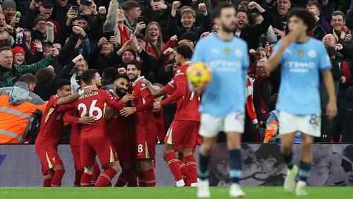 LIVERPOOL, ENGLAND - DECEMBER 01: Mohamed Salah of Liverpool celebrates scoring his teams second goal with teammates during the Premier League match between Liverpool FC and Manchester City FC at Anfield on December 01, 2024 in Liverpool, England. (Photo by Carl Recine/Getty Images)