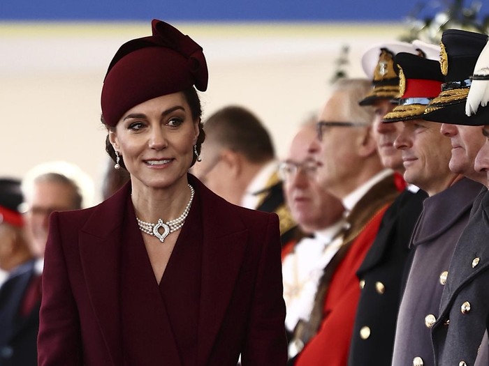 Britains Catherine, Princess of Wales, greets dignitaries as she arrives ahead of a Ceremonial Welcome for the Emir of Qatar Sheikh Tamim bin Hamad Al Thani and his wife Sheikha Jawaher, at Horse Guards Parade in London, Tuesday Dec. 3, 2024. (Henry Nicholls via AP, Pool)