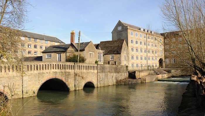 Former silk mill and bridge over the River Avon at Malmesbury, Wiltshire; winter
