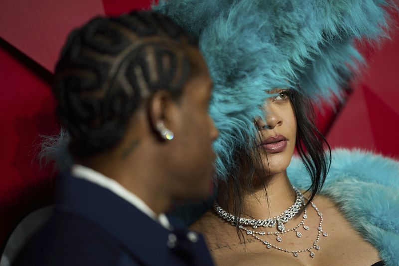 Rihanna and ASAP Rocky pose for photographers upon arrival at the The Fashion Awards 2024 on Monday, Dec. 2, 2024, in London. (Photo by Scott A Garfitt/Invision/AP)