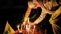 Peringatan itu diadakan beberapa hari setelah gencatan senjata mulai berlaku antara Israel dan Hizbullah, setelah kedua pihak menerima perjanjian yang ditengahi oleh Amerika Serikat dan Prancis. REUTERS/Thaier Al-Sudani