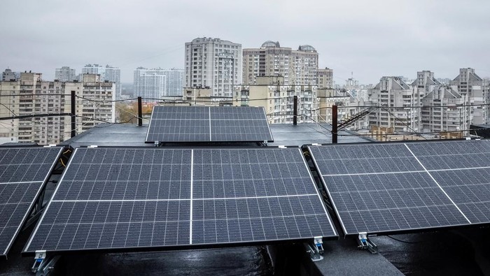 Valerii Pyndyk, head of a housing association board, appears on the roof of an apartment building, where solar panels were installed, amid Russia's attack on Ukraine, in Kyiv, Ukraine, November 14, 2024. REUTERS/Alina Smutko