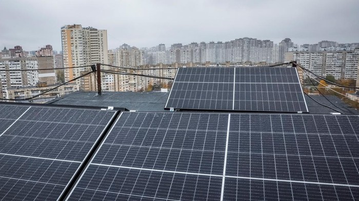 Valerii Pyndyk, head of a housing association board, appears on the roof of an apartment building, where solar panels were installed, amid Russia's attack on Ukraine, in Kyiv, Ukraine, November 14, 2024. REUTERS/Alina Smutko