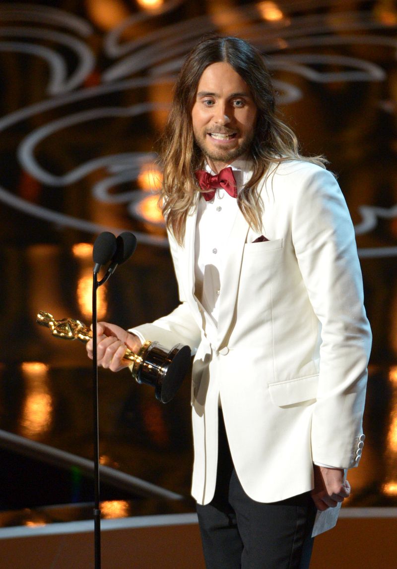 Jared Leto accepts the award for best actor in a supporting role for Dallas Buyers Club during the Oscars at the Dolby Theatre on Sunday, March 2, 2014, in Los Angeles.  (Photo by John Shearer/Invision/AP)