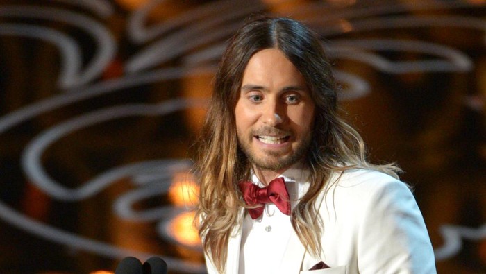 Jared Leto accepts the award for best actor in a supporting role for Dallas Buyers Club during the Oscars at the Dolby Theatre on Sunday, March 2, 2014, in Los Angeles.  (Photo by John Shearer/Invision/AP)