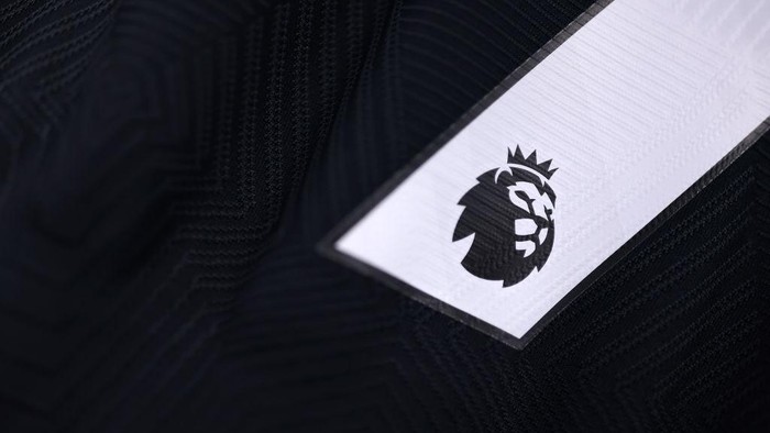 LIVERPOOL, ENGLAND - DECEMBER 04: A detailed view of the Premier League logo, seen on a Wolverhampton Wanderers match shirt inside the dressing room prior to the Premier League match between Everton FC and Wolverhampton Wanderers FC at Goodison Park on December 04, 2024 in Liverpool, England. (Photo by Jack Thomas - WWFC/Wolves via Getty Images)