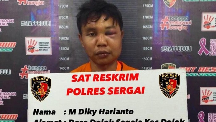 Pelaku Diki Haryanto saat diamankan petugas kepolisian. (Dok. Polres Sergai)