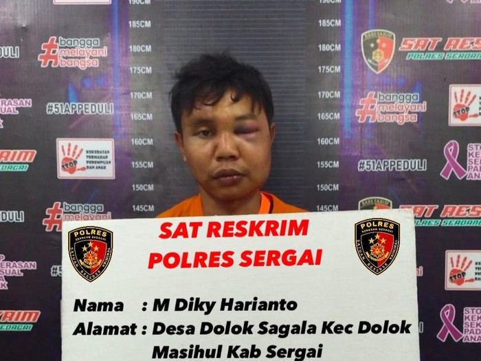Pelaku Diki Haryanto saat diamankan petugas kepolisian. (Dok. Polres Sergai)
