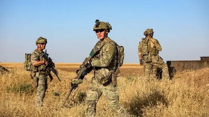 US troops patrol near an oil field in al-Qahtaniyah in Syrias northeastern Hasakah province, close to the border with Turkey, on June 14, 2023. (AFP)