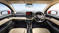 Honda Amaze baru telah dibekali sejumlah fitur kekinian, mulai dari layar sentuh berukuran besar yang bisa terhubung dengan ponsel melalui aplikasi Apple CarPlay dan Android Auto, panel instrumen 7 inch semi-digital, automatic climate control, enam airbags, kamera mundur, ADAS dan masih banyak lagi. Foto: Doc. Honda India.