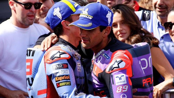 ALCANIZ, SPAIN - SEPTEMBER 01: Marc Marquez from Spain of Gresini Racing MotoGP and Jorge Martin from Spain of Prima Pramac Racing  speaking after the MotoGp Of Aragon Race at Motorland Aragon Circuit on September 01, 2024 in Alcaniz, Spain. (Photo by Joan Cros - Corbis/Getty Images)