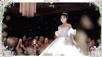 Nita Vior memakai ball gown berwarna putih tanpa lengan dan kerah. Rambutnya disanggul satu meambah anggun penampilannya. Foto: dok. Channel YouTube Nita Vior
