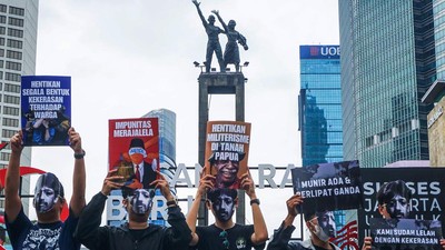 Pakai Topeng Munir, Aktivis Peringati Hari HAM di CFD Jakarta