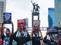 Pakai Topeng Munir, Aktivis Peringati Hari HAM di CFD Jakarta