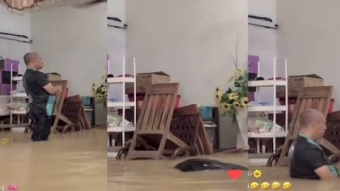Viral pria yang salat di tengah banjir