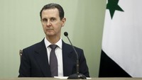 Melansir Al Jazeera, Bashar al-Assad, 59 tahun, adalah Presiden Suriah yang sudah 24 tahun berkuasa. (Borna News/Matin Ghasemi/Aksonline ATPImages/Getty Images) 