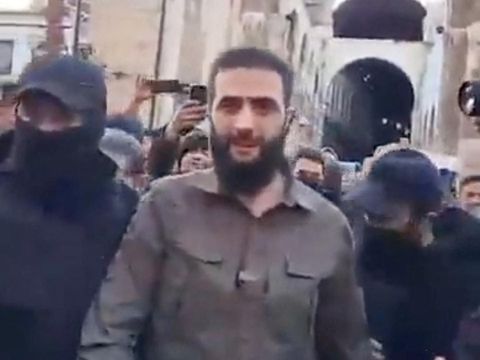 Abu Mohammed al-Golani walks in Damascus, Syria December 8, 2024 in this screen grab obtained from a social media video. SOCIAL MEDIA/via REUTERS THIS IMAGE HAS BEEN SUPPLIED BY A THIRD PARTY. MANDATORY CREDIT. NO RESALES. NO ARCHIVES.