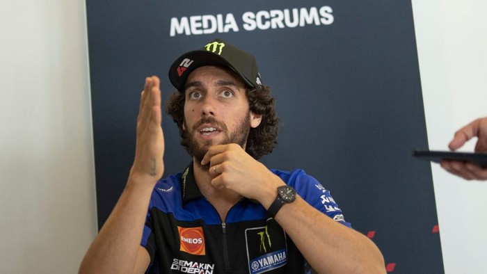 BURIRAM, THAILAND - OCTOBER 23: Alex Rins of Spain and Monster Energy Yamaha MotoGPspeaks with journalists during the media scrums in media center  during the MotoGP Of Thailand - Previews at Chang International Circuit on October 24, 2024 in Buriram, Thailand. (Photo by Mirco Lazzari gp/Getty Images)