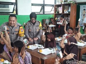 Polres Pasuruan Bagikan Makan Bergizi Gratis Bagi Puluhan Siswa SD