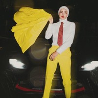 Wanita yang bernama lengkap Lidya Febiola Ramlan ini memakai kemeja putih dan celana kuning. Foto: Dok. Instagram @ollaramlan.