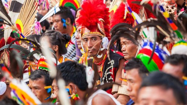 Mixed group of Naga tribes watching Hornbill Festival on December 4 2012, Nagaland, North-eastern India