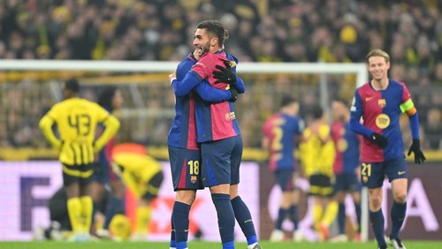 DORTMUND, GERMANY - DECEMBER 11: Ferran Torres of FC Barcelona celebrates with teammate Pau Victor at the end of the UEFA Champions League 2024/25 League Phase MD6 match between Borussia Dortmund and FC Barcelona at BVB Stadion Dortmund on December 11, 2024 in Dortmund, Germany. (Photo by Sebastian Widmann - UEFA/UEFA via Getty Images)